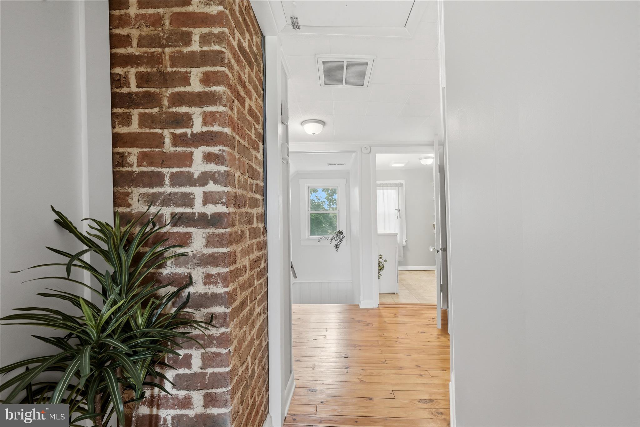 1239 Cedar Grove Road Winchester, VA 22603 - Photo 46 of 82 Hallway upstairs has exposed brick!