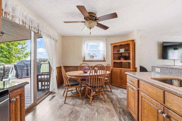 19 Yankee Ridge Road Mercer, PA 16137 - Photo 15 of 42 a dining room with furniture a chandelier and wooden floor