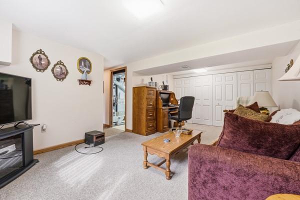 19 Yankee Ridge Road Mercer, PA 16137 - Photo 20 of 42 a room with furniture and a flat screen tv