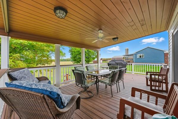 19 Yankee Ridge Road Mercer, PA 16137 - Photo 33 of 42 a view of a patio with table and chairs with wooden floor and fence
