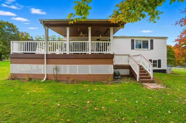 19 Yankee Ridge Road Mercer, PA 16137 - Photo 36 of 42 a view of a house with a yard deck and a small yard