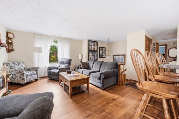 19 Yankee Ridge Road Mercer, PA 16137 - Photo 6 of 42 a living room with furniture and a rug