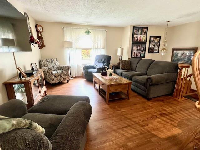 19 Yankee Ridge Road Mercer, PA 16137 - Photo 7 of 42 a living room with furniture and a flat screen tv