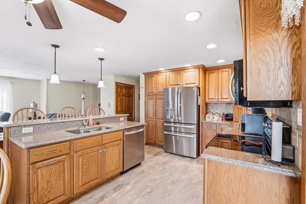 19 Yankee Ridge Road Mercer, PA 16137 - Photo 9 of 42 a kitchen with a sink stove and refrigerator