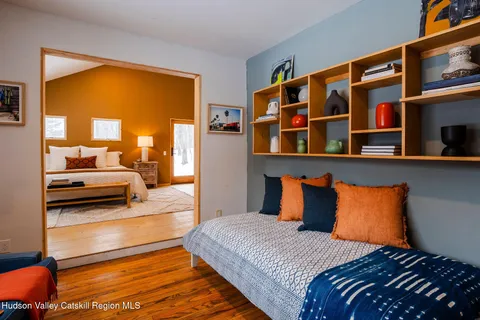 a bedroom with a bed and walk in closet