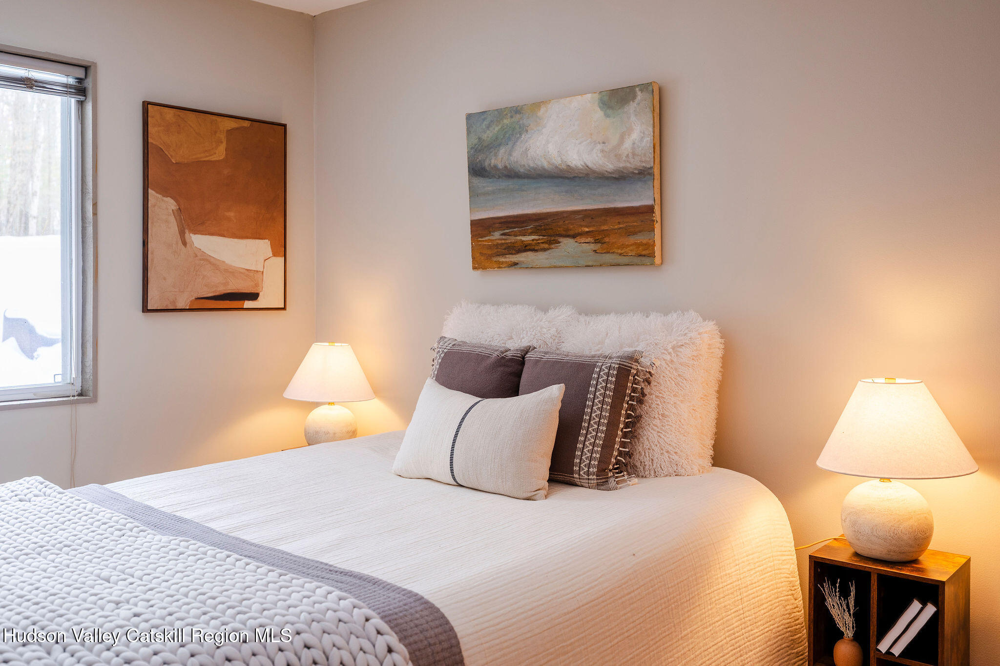 171 West Hurley Road West Hurley, NY 12491 - Photo 28 of 37 a bedroom with a bed and a painting on the wall
