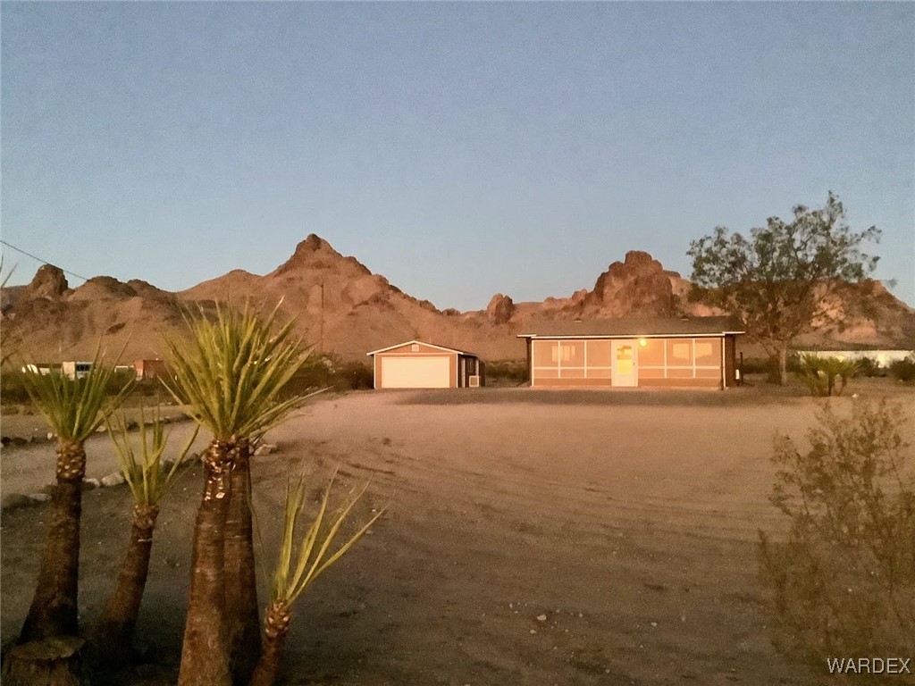 2661 Papago Road Golden Valley, AZ 86413 - Photo 2 of 30 a view of a house with a yard