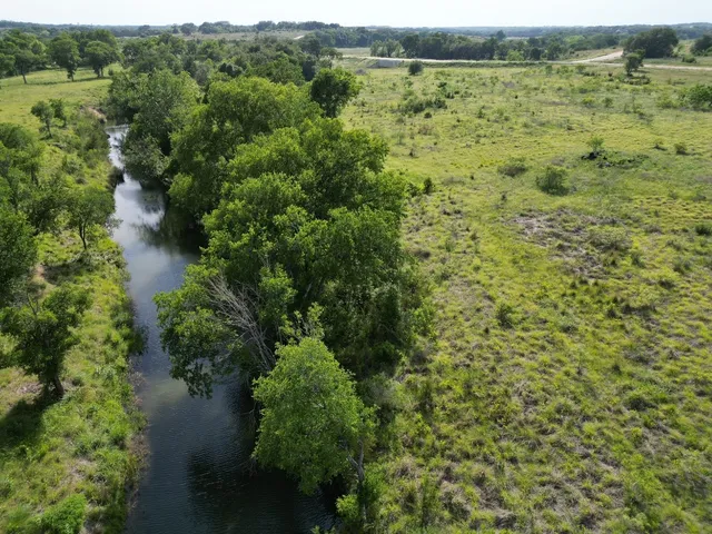 a view of a lake with an outdoor space