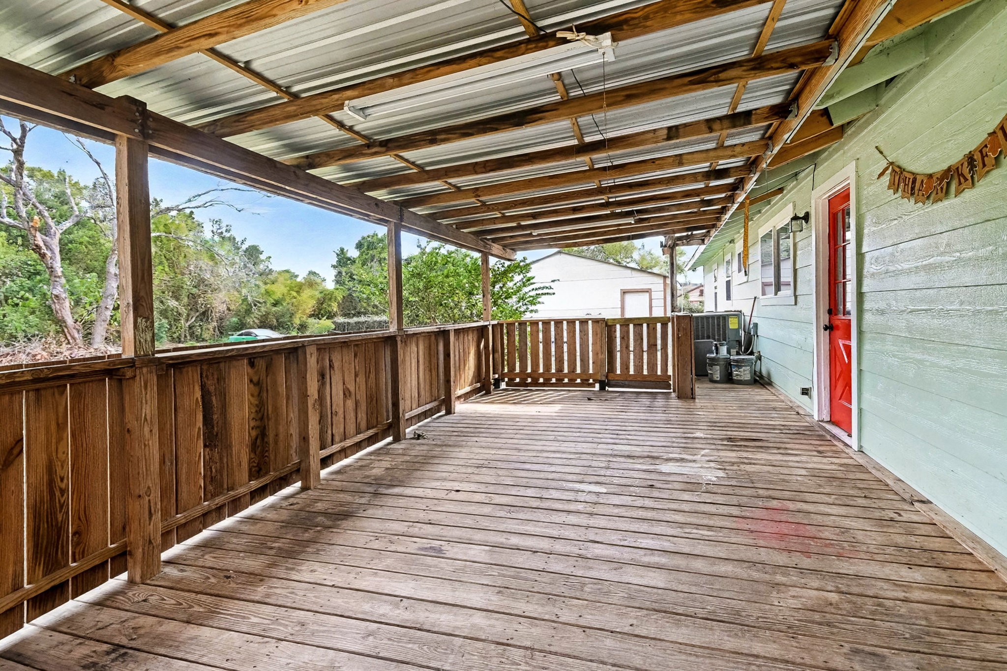 1627 Texas Avenue League City, TX 77573 - Photo 24 of 26 a view of outdoor space with wooden deck