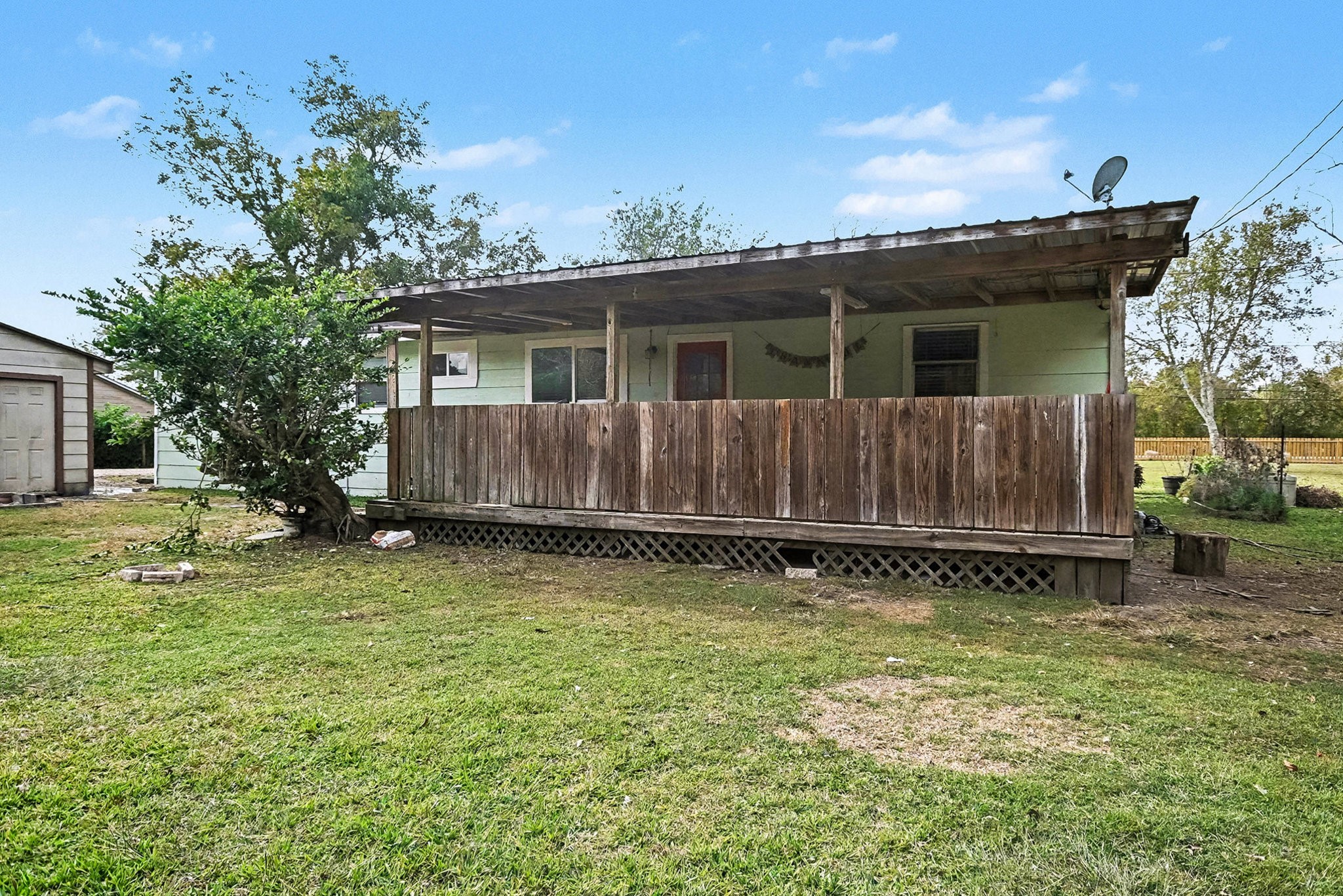 1627 Texas Avenue League City, TX 77573 - Photo 25 of 26 a view of a house with a yard