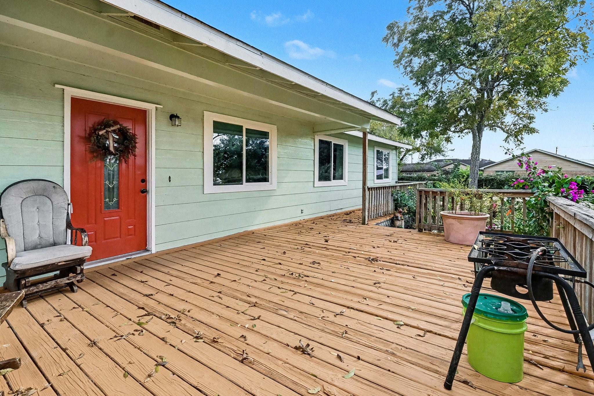 1627 Texas Avenue League City, TX 77573 - Photo 8 of 26 a bedroom with a bed and a barbeque