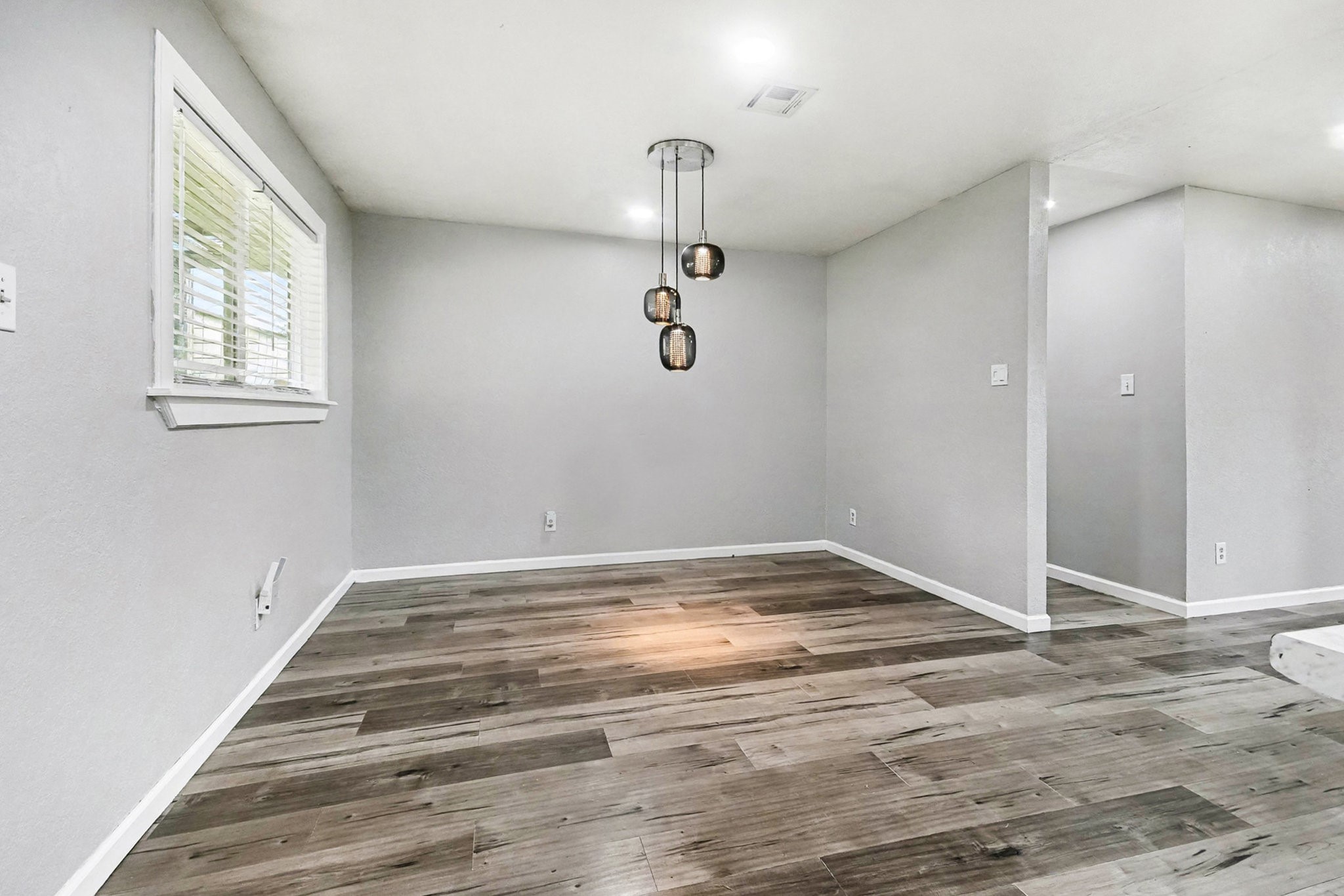 1627 Texas Avenue League City, TX 77573 - Photo 10 of 26 a view of a room with a ceiling fan and window