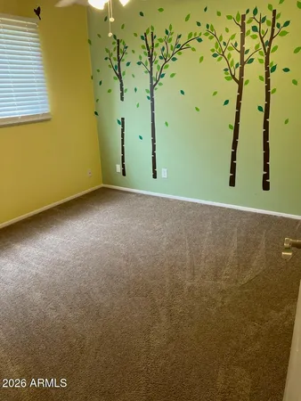 a view of an empty room with window