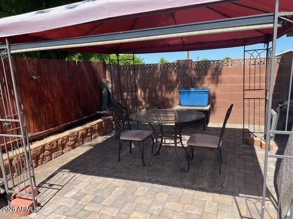 a front view of a house with parking space