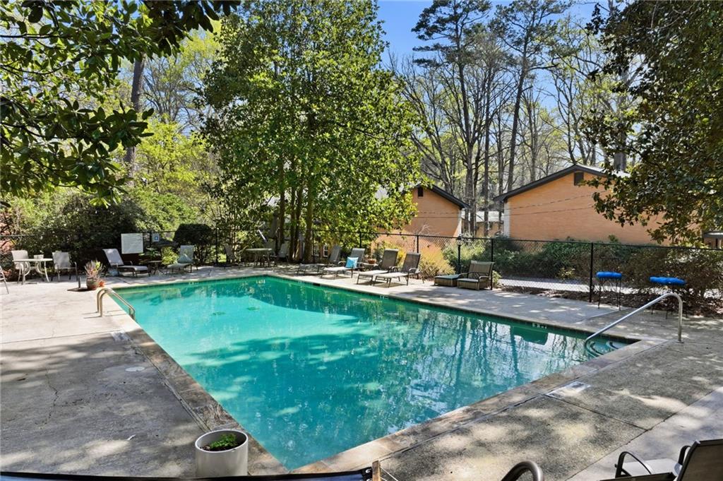 1010 Scott Boulevard, Unit A2 Decatur, GA 30030 - Photo 20 of 23 a view of a swimming pool with a patio