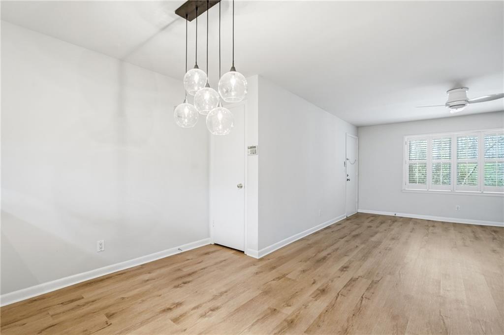 1010 Scott Boulevard, Unit A2 Decatur, GA 30030 - Photo 7 of 23 wooden floor in an empty room with a window