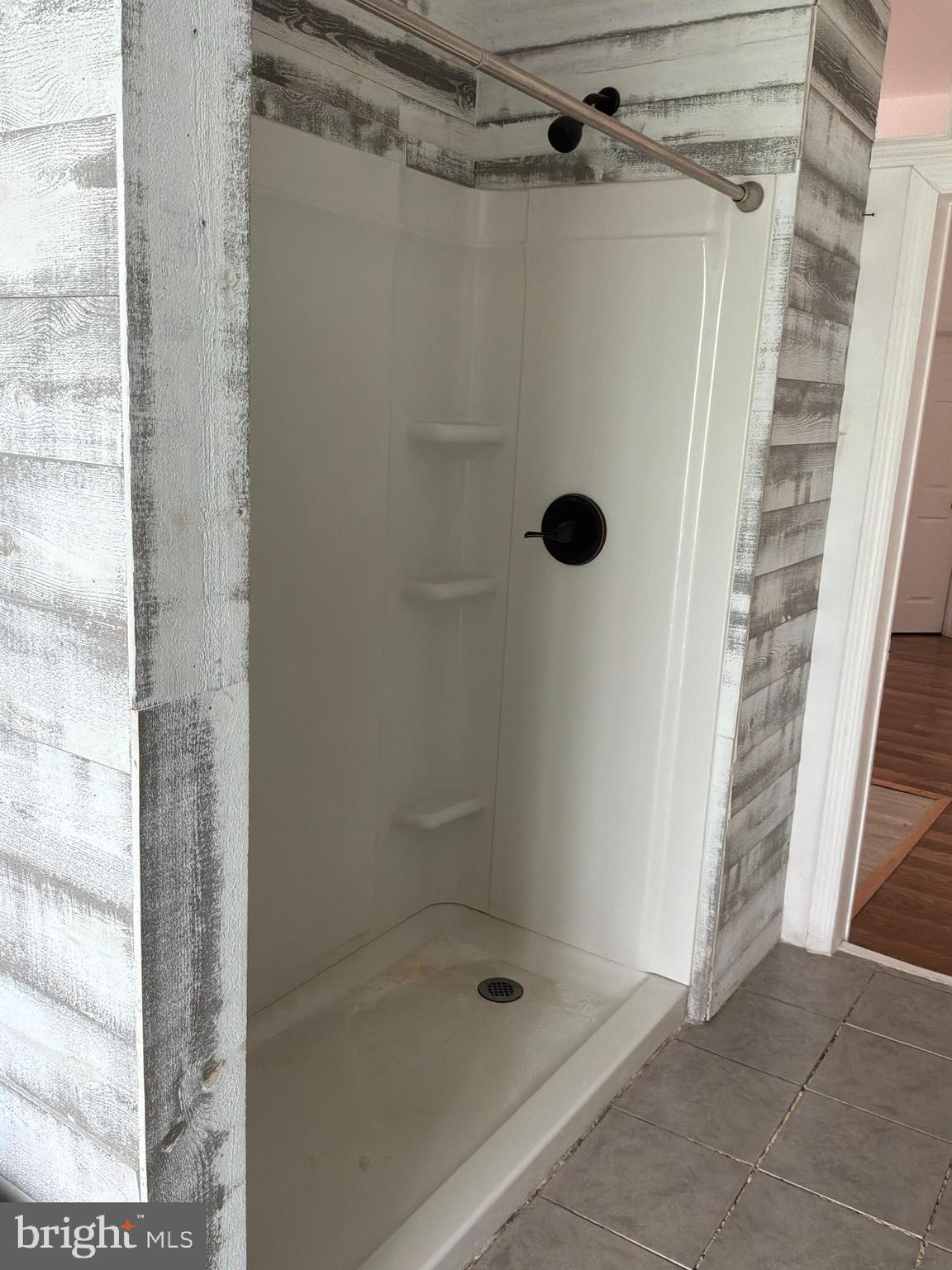 1359 Main Street, Unit B2 Woodside, DE 19904 - Photo 15 of 15 a bathroom with a shower