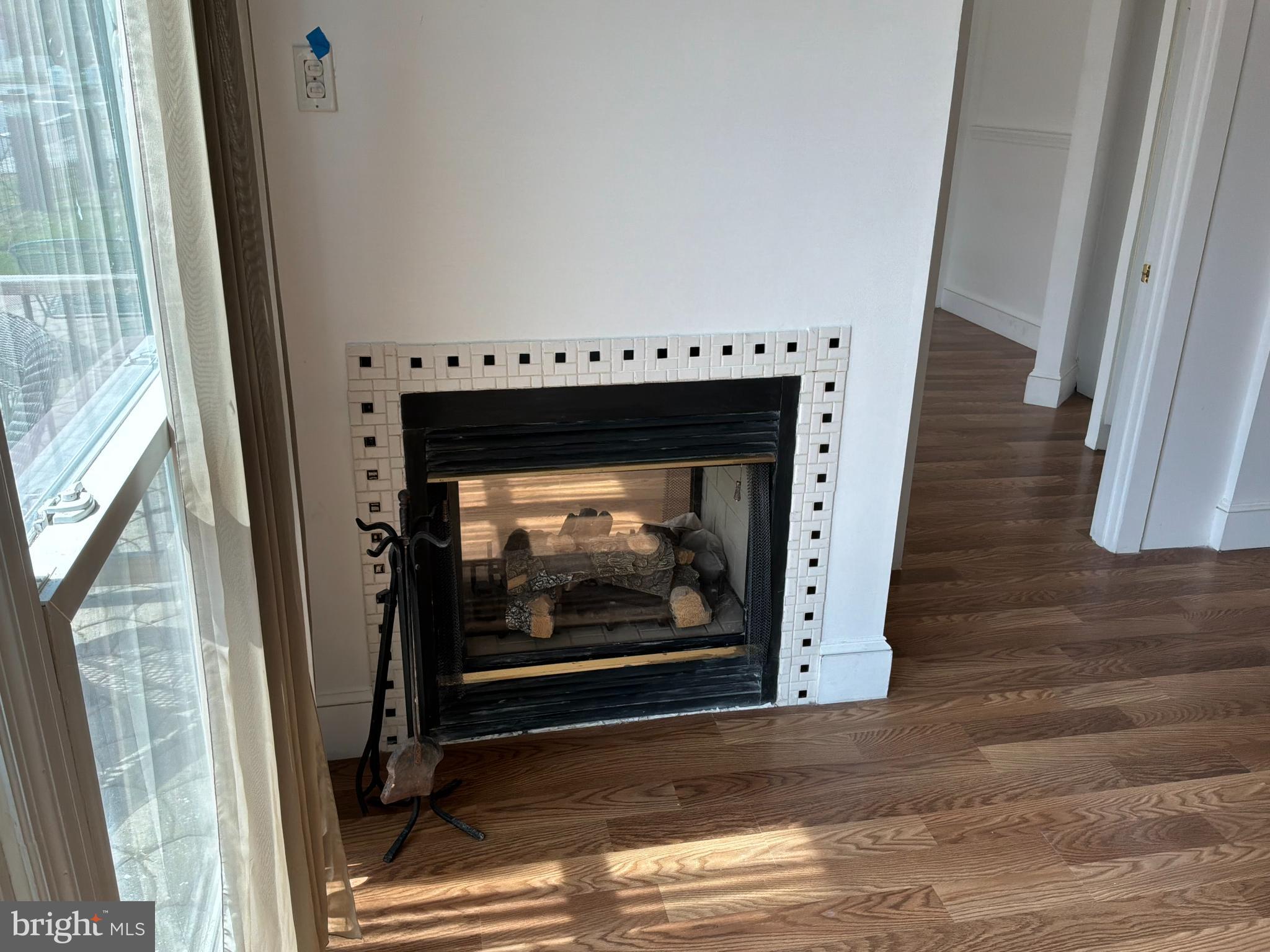 1359 Main Street, Unit B2 Woodside, DE 19904 - Photo 5 of 15 a view of an entryway with a fireplace