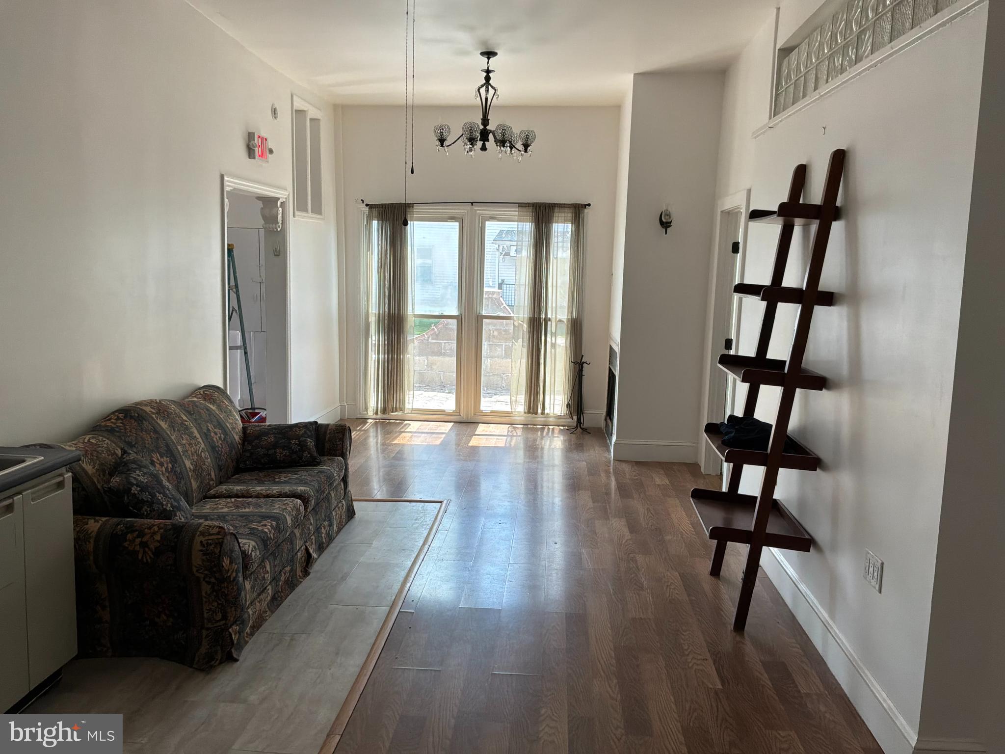1359 Main Street, Unit B2 Woodside, DE 19904 - Photo 6 of 15 a living room with furniture and a hard wood floor