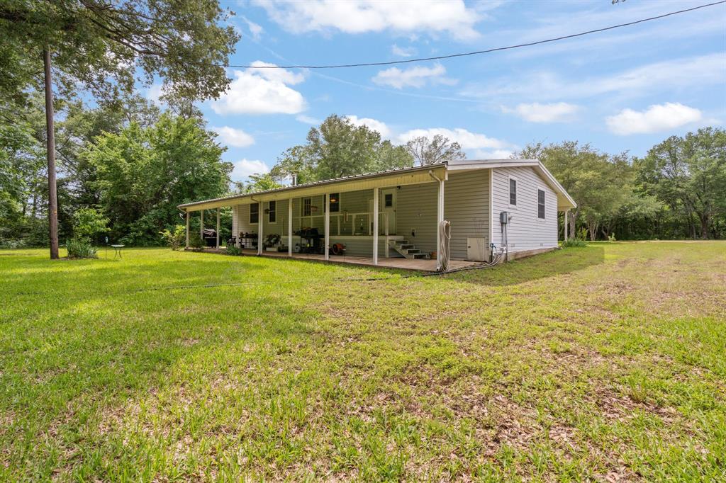 9547 County Road 346 Terrell, TX 75161 - Photo 21 of 37 Rear Corner View of Main Home with Patio