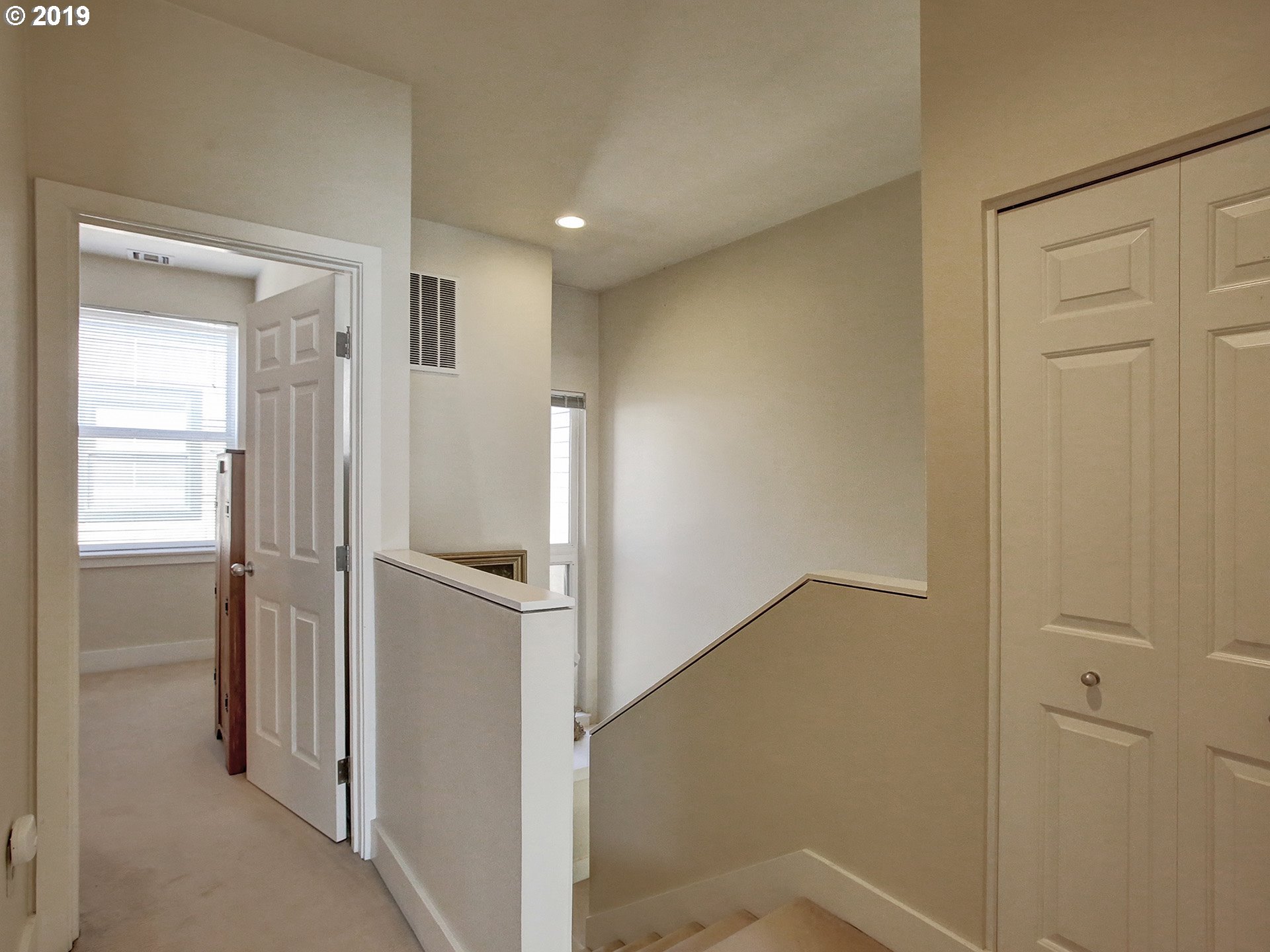 715 Southeast 34th Avenue Portland, OR 97214 - Photo 14 of 24 a view of a hallway with closet area