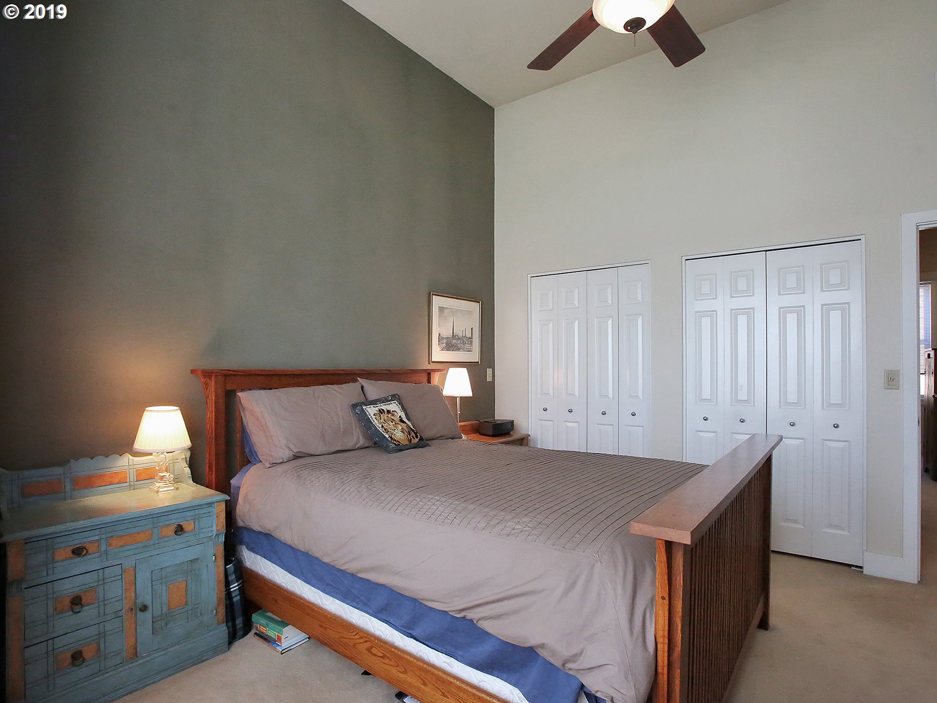 715 Southeast 34th Avenue Portland, OR 97214 - Photo 16 of 24 a bedroom with a bed and a night stand