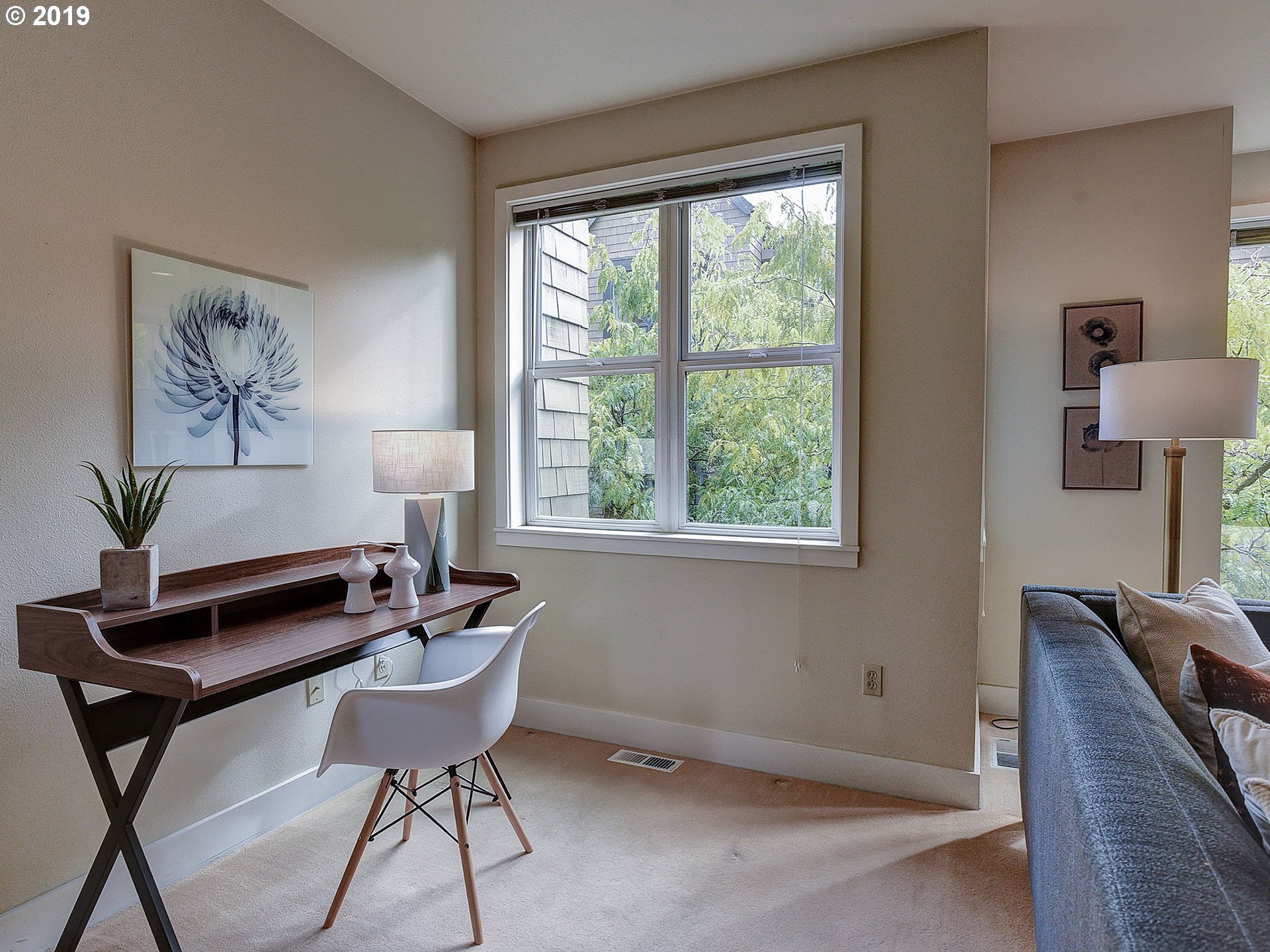 715 Southeast 34th Avenue Portland, OR 97214 - Photo 7 of 24 a living room with furniture and a window