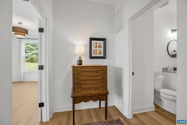 a view of a bathroom with a glass door shower