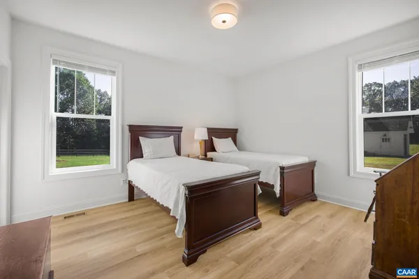 a view of a swimming pool and an outdoor space