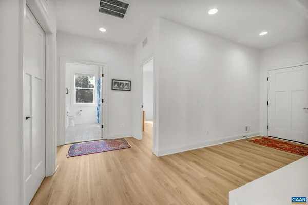 a view of a house with swimming pool and a yard