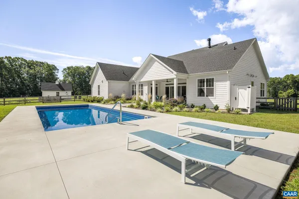 a view of a lake with a yard