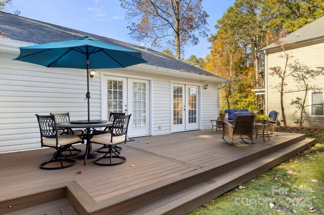 a view of yard with patio