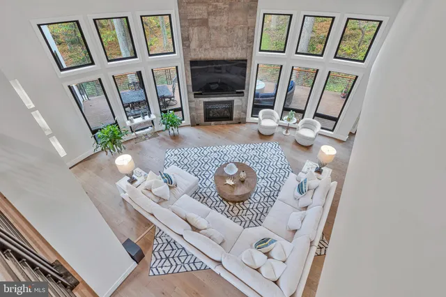 a bathroom with a toilet a sink and a mirror