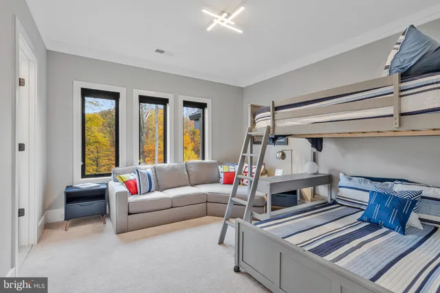 a living room with lots of furniture and a flat screen tv