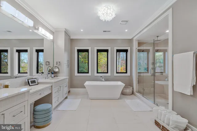 a kitchen with counter top space cabinets and stainless steel appliances