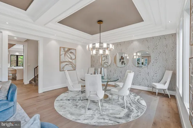 a view of a house with a yard balcony and sitting area