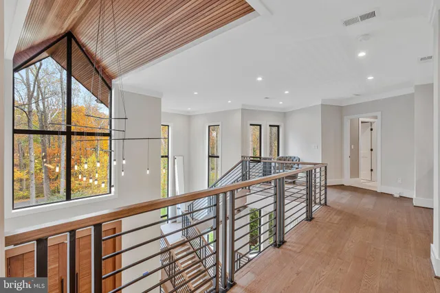 a bedroom with a large bed and a couch