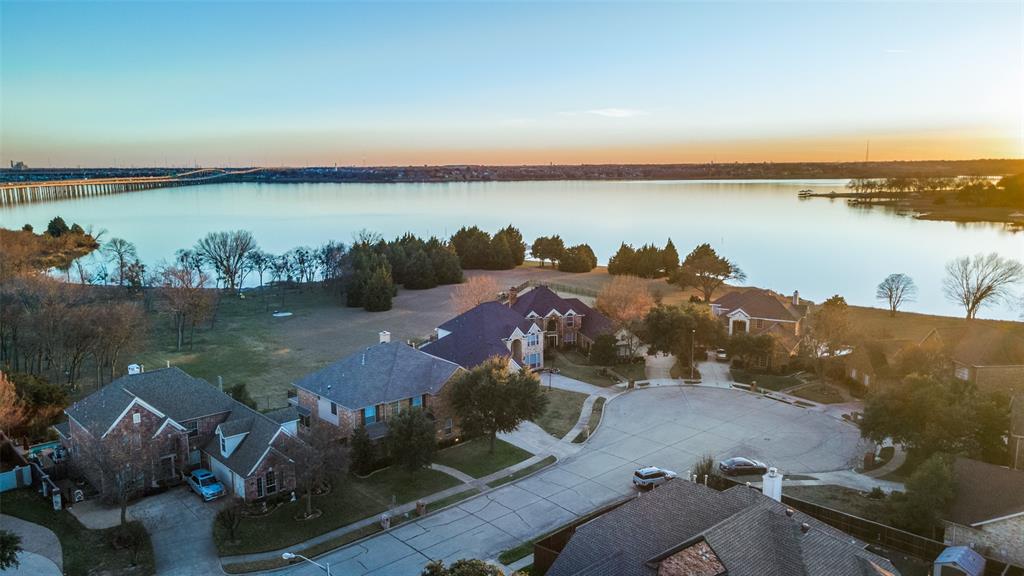 1802 Benedict Court Rowlett, TX 75088 - Photo 1 of 30 an aerial view of a house with a lake view