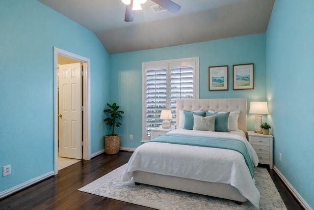 1802 Benedict Court Rowlett, TX 75088 - Photo 18 of 30 a bedroom with a bed and a potted plant