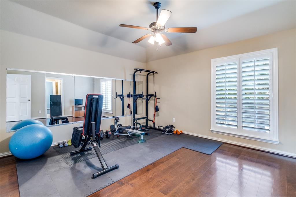 1802 Benedict Court Rowlett, TX 75088 - Photo 21 of 30 a view of a room with gym equipment