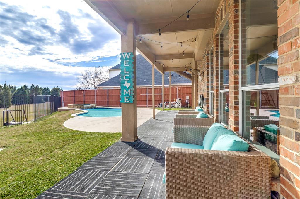 1802 Benedict Court Rowlett, TX 75088 - Photo 22 of 30 a view of a house with a swimming pool