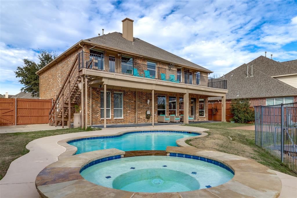 1802 Benedict Court Rowlett, TX 75088 - Photo 24 of 30 a front view of a house with a garden