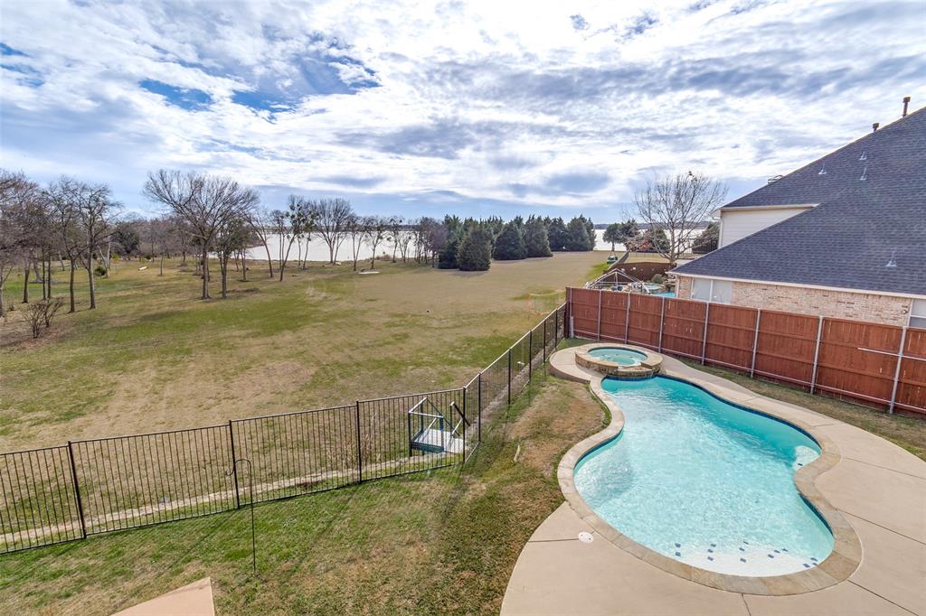 1802 Benedict Court Rowlett, TX 75088 - Photo 27 of 30 a view of a swimming pool with a yard