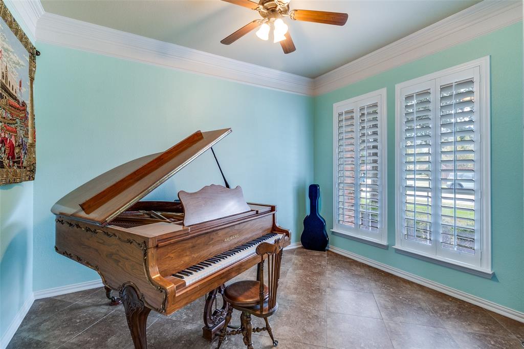 1802 Benedict Court Rowlett, TX 75088 - Photo 5 of 30 a view of a livingroom with furniture and staircase