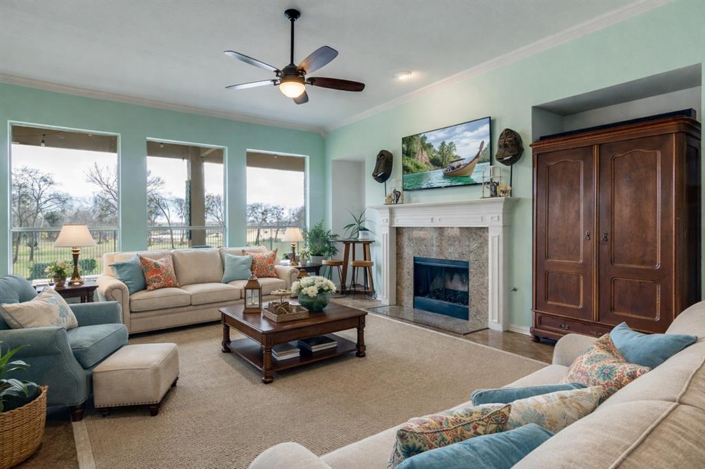 1802 Benedict Court Rowlett, TX 75088 - Photo 6 of 30 a living room with furniture and a fireplace