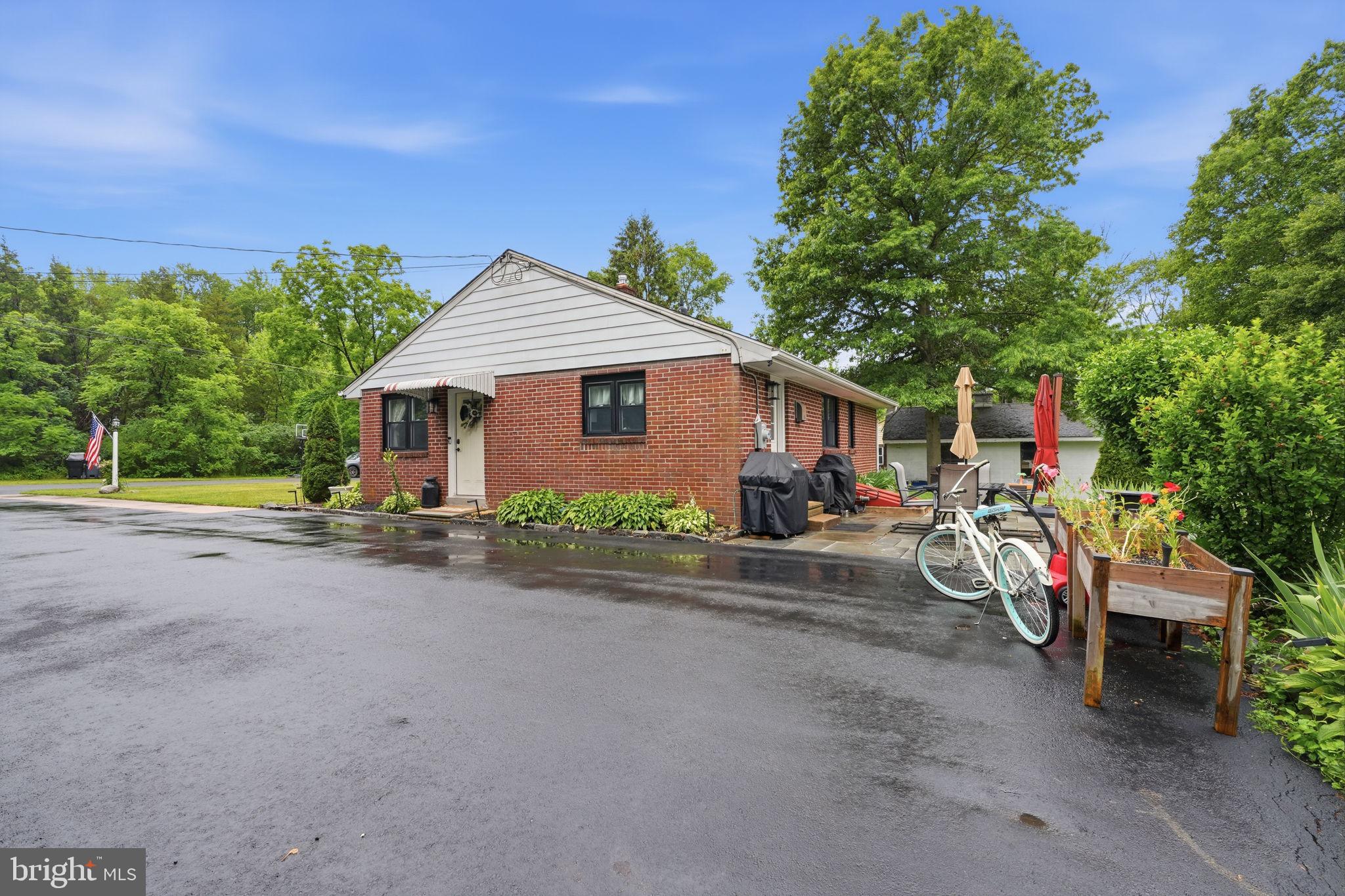 20 Poplar Road Ringoes, NJ 08551 - Photo 25 of 44 Charming brick home with lush greenery.