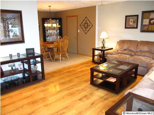 90 Andover Road Jackson, NJ 08527 - Photo 2 of 3 a living room with furniture and wooden floor