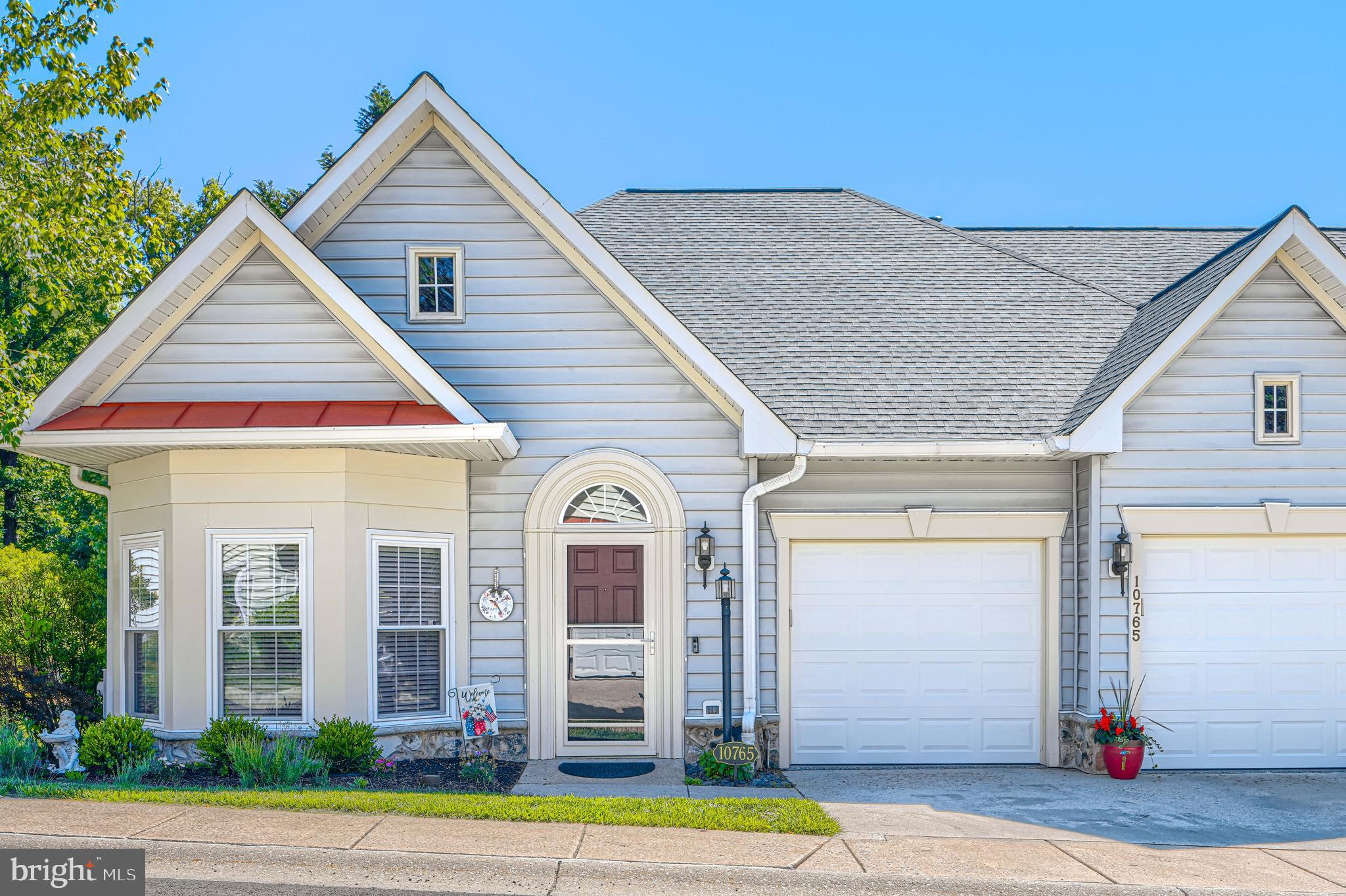 10765 Autumn Splendor Drive, Unit 52 Columbia, MD 21044 - Photo 2 of 29 Front view - 2 car garage