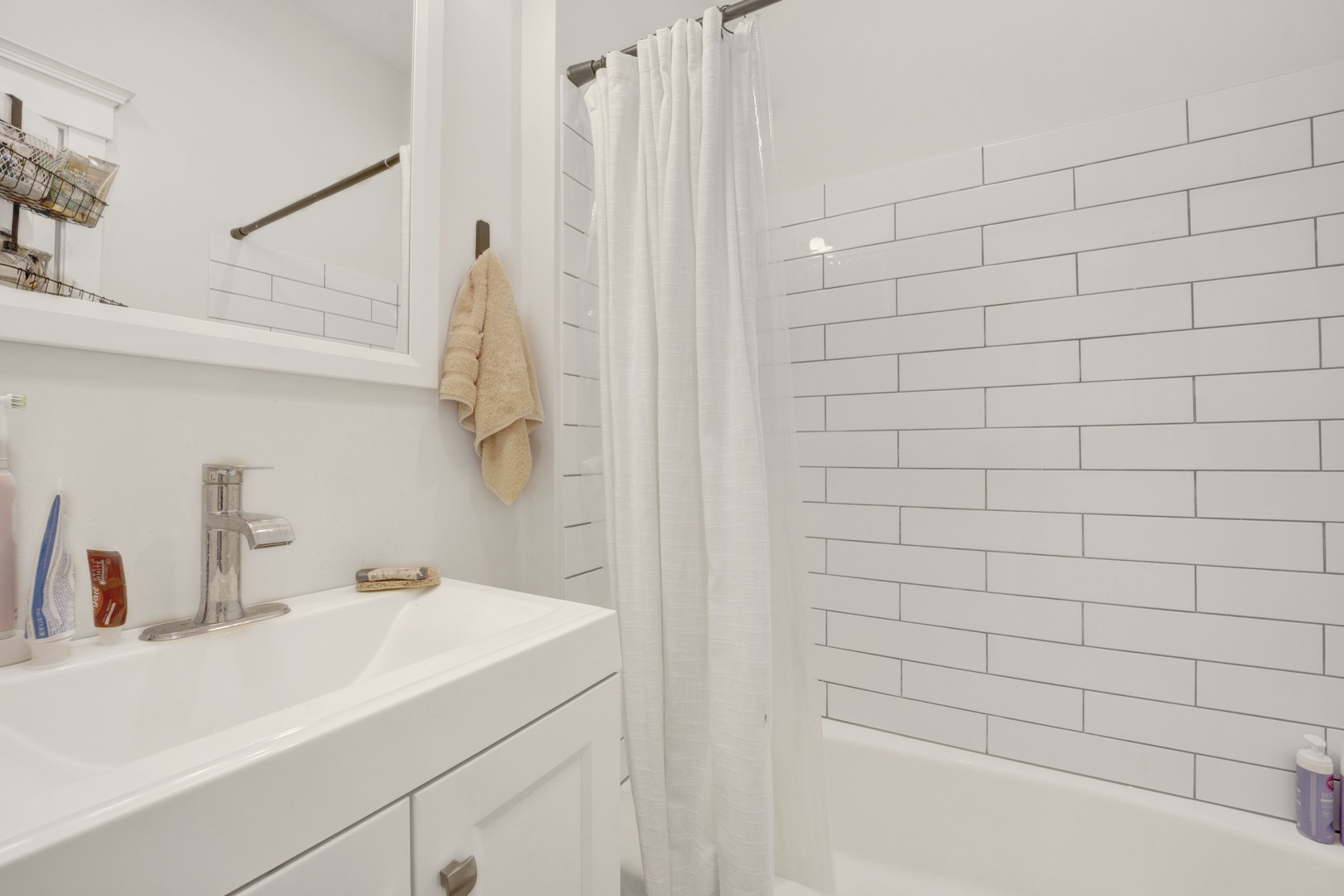 3934 North Sheridan Road, Unit 3 Chicago, IL 60613 - Photo 11 of 12 a bathroom with a sink and a shower