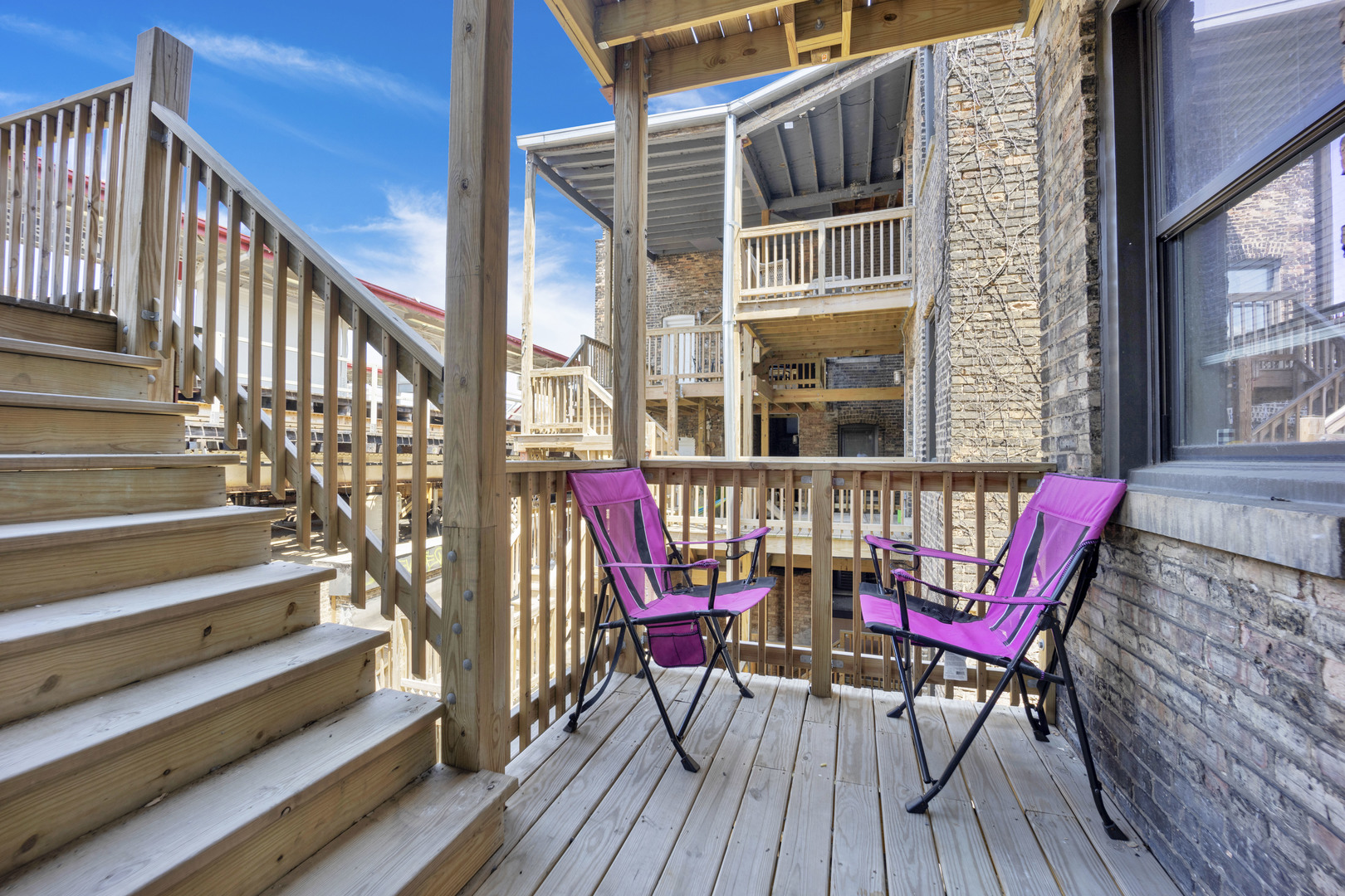 3934 North Sheridan Road, Unit 3 Chicago, IL 60613 - Photo 12 of 12 a view of deck with a bench and wooden floor